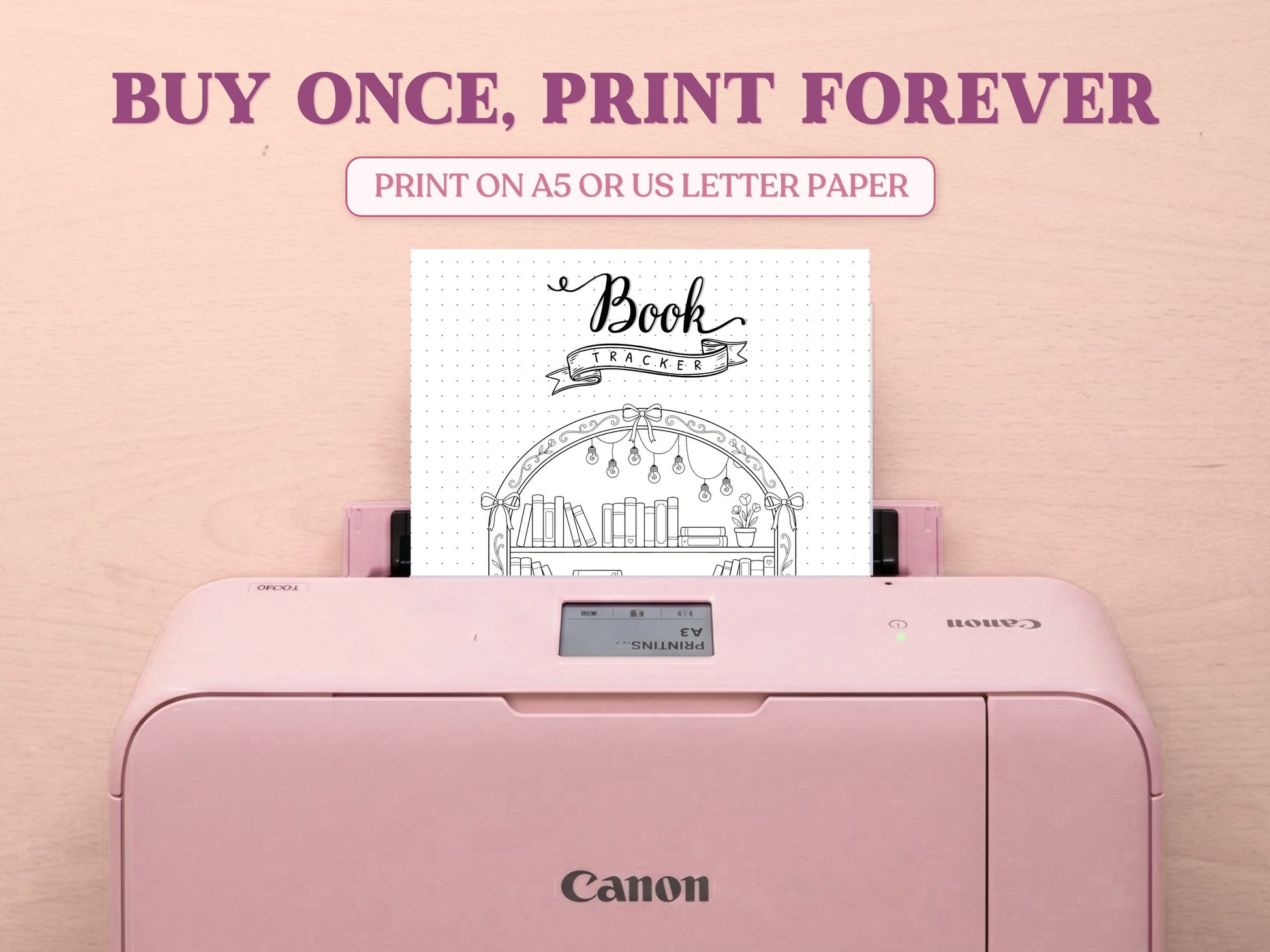 A printable arched bookshelf tracker template coming out of a pastel pink Canon printer on a light wood desk layout. The promotional text features 'BUY ONCE, PRINT FOREVER' and 'PRINT ON A5 OR US LETTER PAPER' to highlight its printable features for a bullet journal.