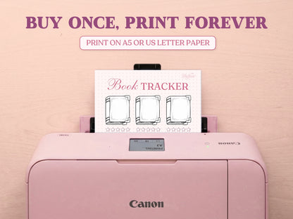 A printable book review tracking template coming out of a pastel pink Canon printer on a wooden desk. Features bold title overlays 'BUY ONCE, PRINT FOREVER' and 'PRINT ON A5 OR US LETTER PAPER' to highlight the printable options for this bullet journal page.