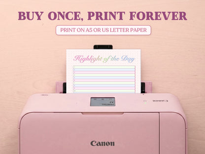 A printable 'Highlight of the Day' tracker page being printed from a pastel pink Canon printer on a light wood desk setup. The image template includes large decorative text overlays saying 'BUY ONCE, PRINT FOREVER' and 'PRINT ON A5 OR US LETTER PAPER' to highlight its printable features for a bullet journal.