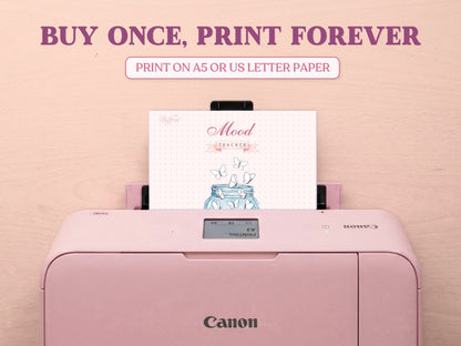 A printable butterfly jar mood tracker page being printed out of a pastel pink Canon printer on a wooden desk. Features large promotional text reading 'BUY ONCE, PRINT FOREVER' and 'PRINT ON A5 OR US LETTER PAPER' to emphasize it is a printable bullet journal template.