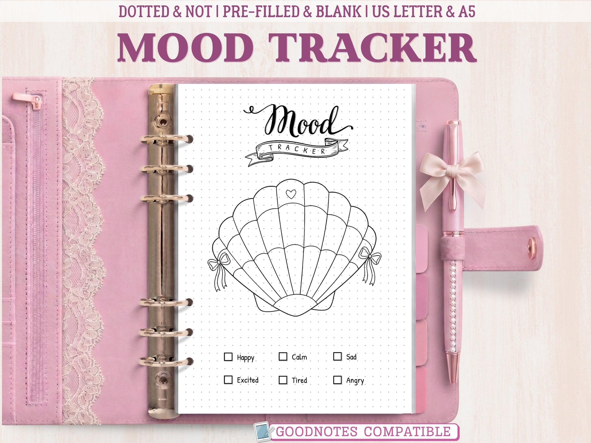 A minimalist seashell mood tracker page for a bullet journal displayed inside an open pink leather binder decorated with lace. Features a black and white line-art seashell with 31 numbered sections to color and a mood key at the bottom. Labeled as GoodNotes compatible.
