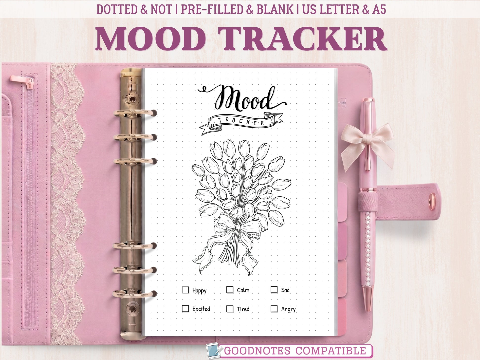 A bullet journal mood tracker page featuring a beautiful tulip bouquet line-art design, displayed inside an open pink leather binder decorated with lace. Includes a mood key at the bottom. Labeled as GoodNotes compatible.