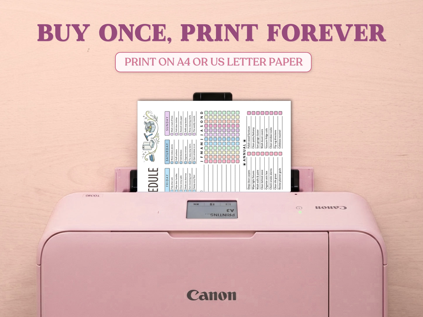 A printed page of the colorful cleaning schedule layout chart template emerging from a pastel pink Canon printer on a light wood desk setup. Prominently displays the text 'Buy Once, Print Forever' and 'Print on A4 or US Letter Paper'.