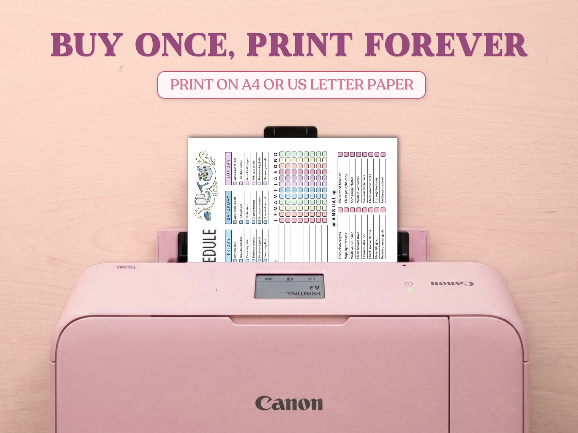 A printed page of the colorful cleaning schedule layout chart template emerging from a pastel pink Canon printer on a light wood desk setup. Prominently displays the text 'Buy Once, Print Forever' and 'Print on A4 or US Letter Paper'.