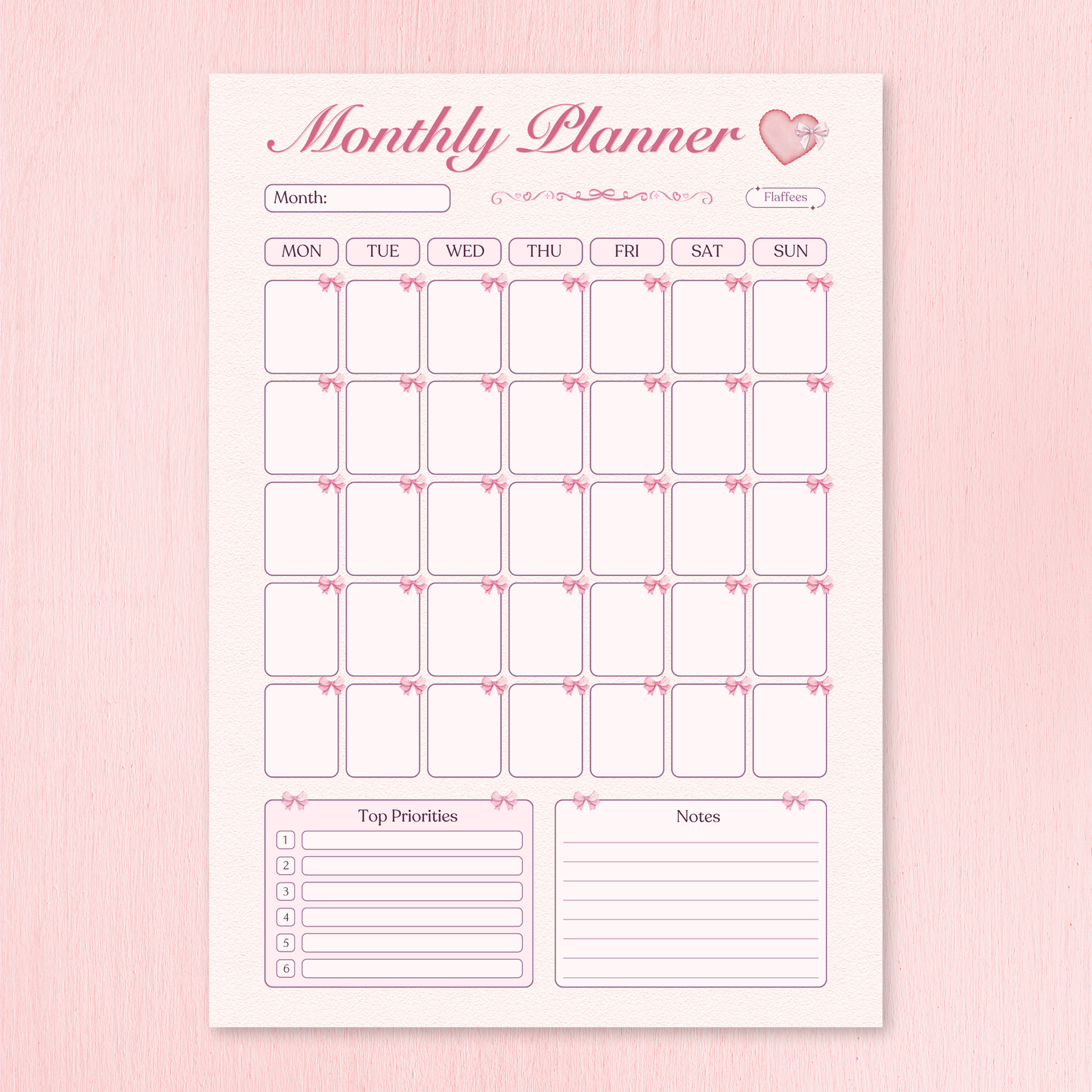 Monthly planner with calendar and notes section on a pink background